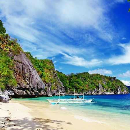 Mbg Travellers Inn Powered By Cocotel Puerto Princesa Luaran gambar