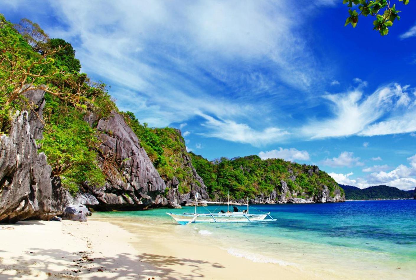 Mbg Travellers Inn Powered By Cocotel Puerto Princesa Luaran gambar