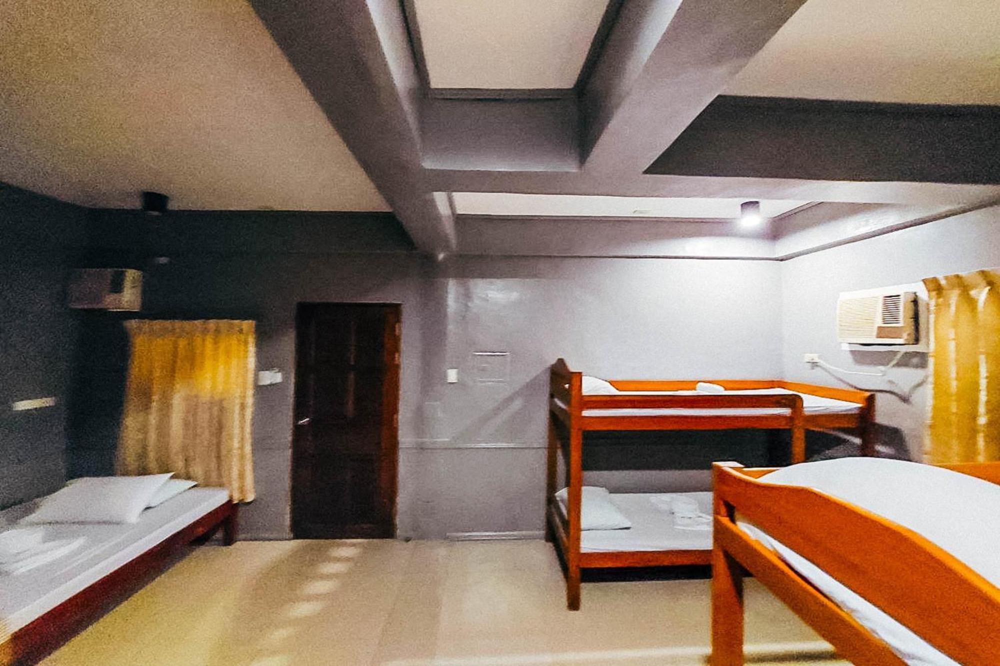 Mbg Travellers Inn Powered By Cocotel Puerto Princesa Bilik gambar