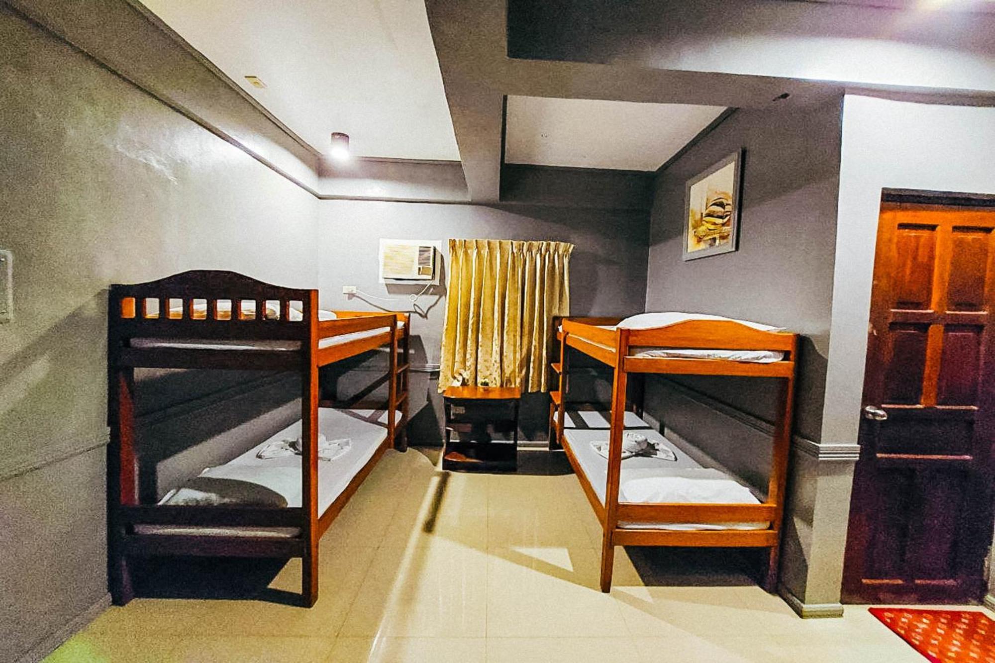 Mbg Travellers Inn Powered By Cocotel Puerto Princesa Bilik gambar
