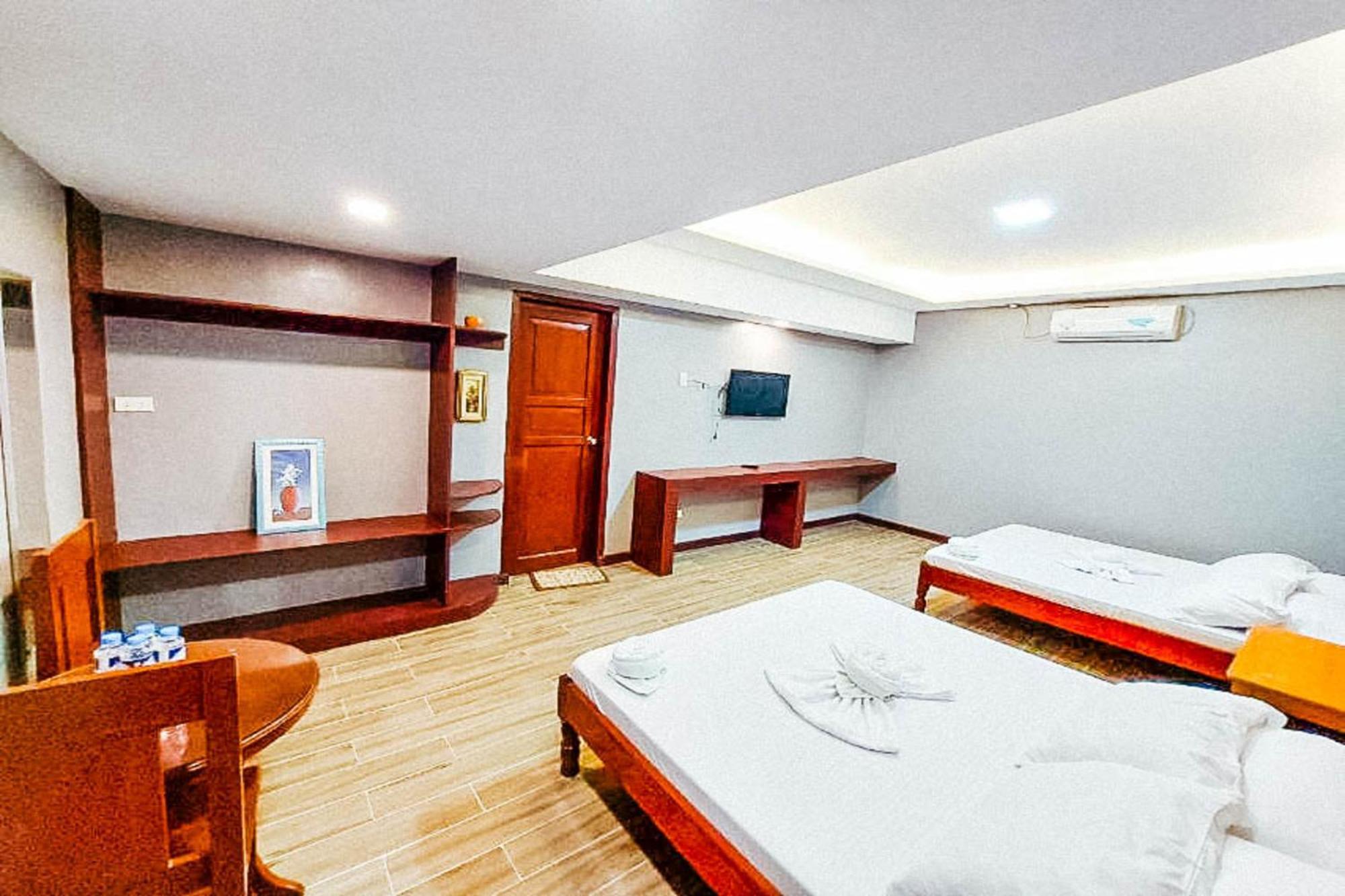Mbg Travellers Inn Powered By Cocotel Puerto Princesa Bilik gambar