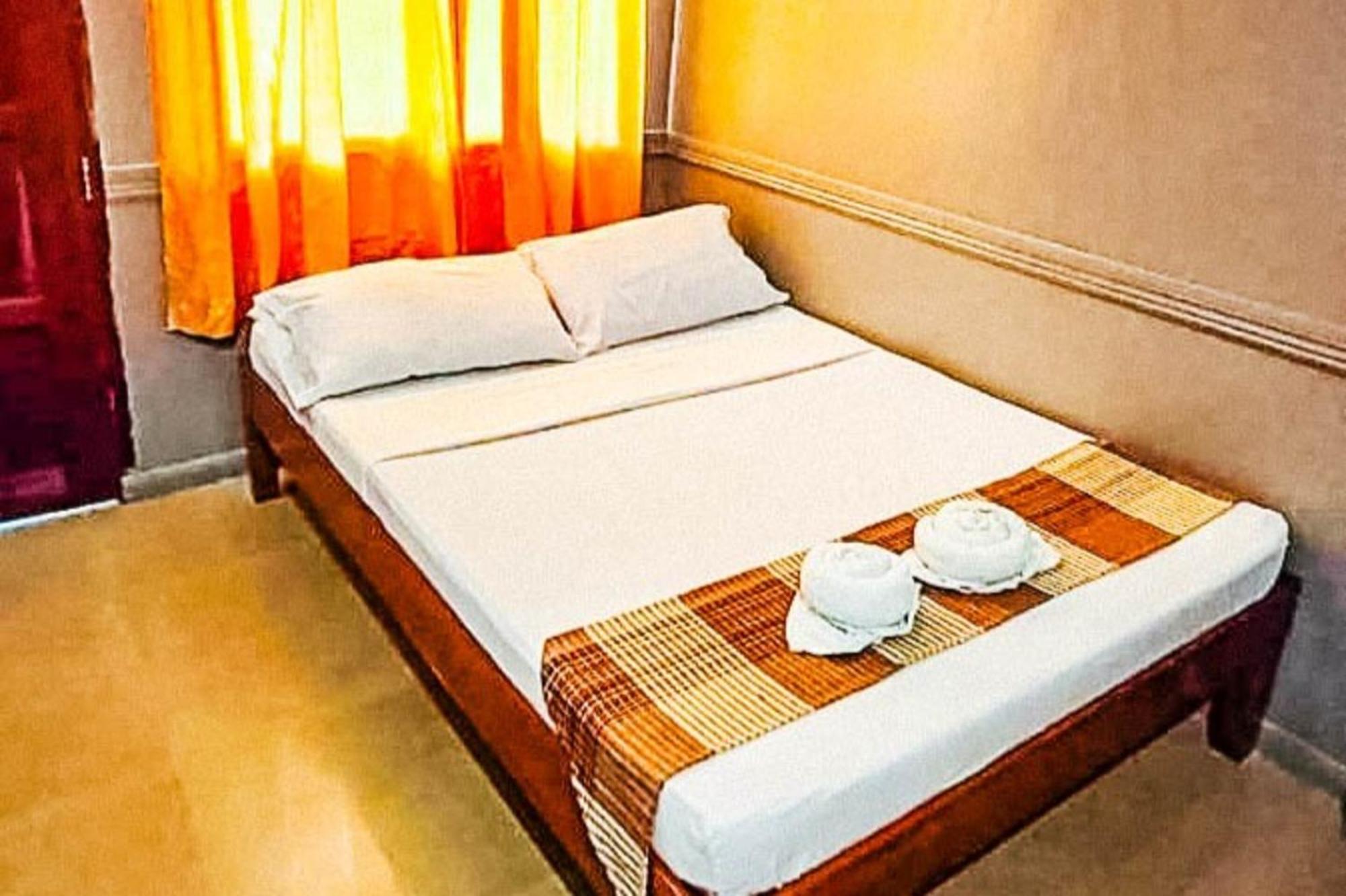 Mbg Travellers Inn Powered By Cocotel Puerto Princesa Bilik gambar