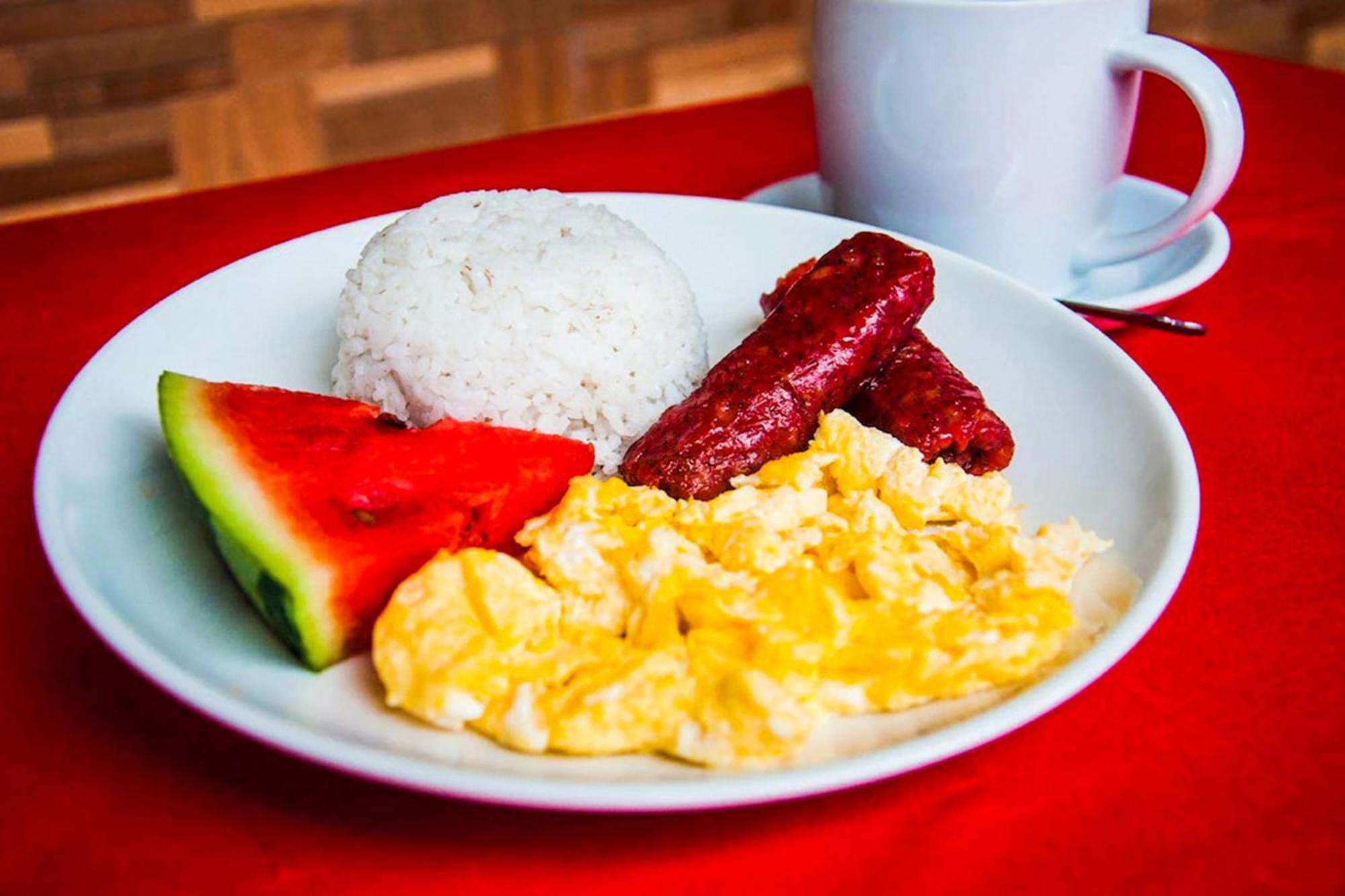Mbg Travellers Inn Powered By Cocotel Puerto Princesa Luaran gambar