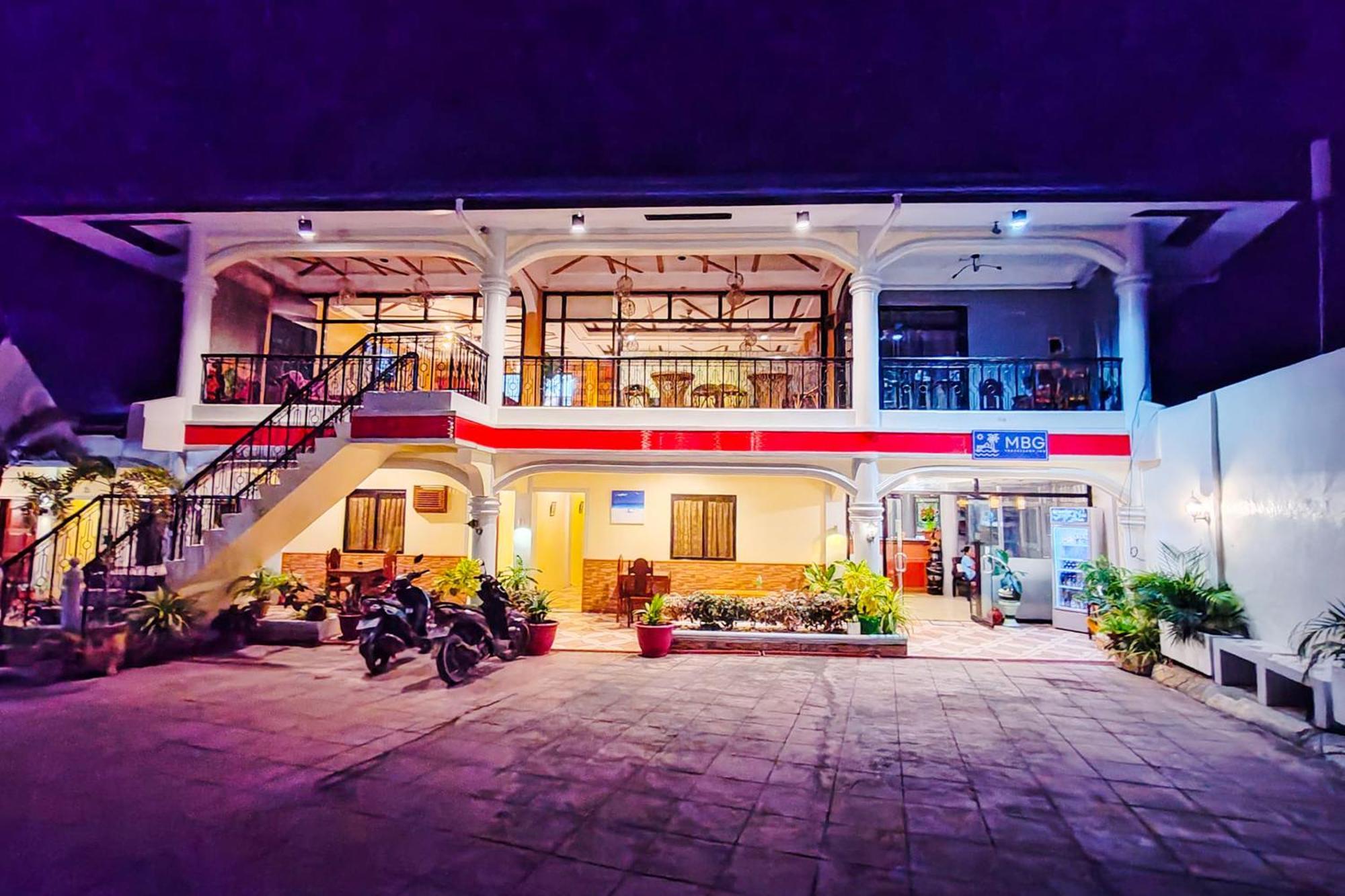 Mbg Travellers Inn Powered By Cocotel Puerto Princesa Luaran gambar