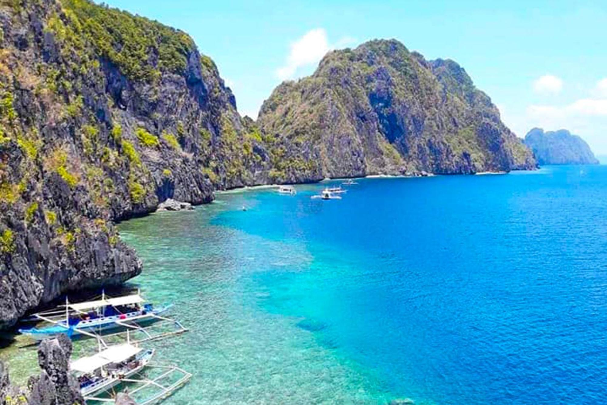 Mbg Travellers Inn Powered By Cocotel Puerto Princesa Luaran gambar