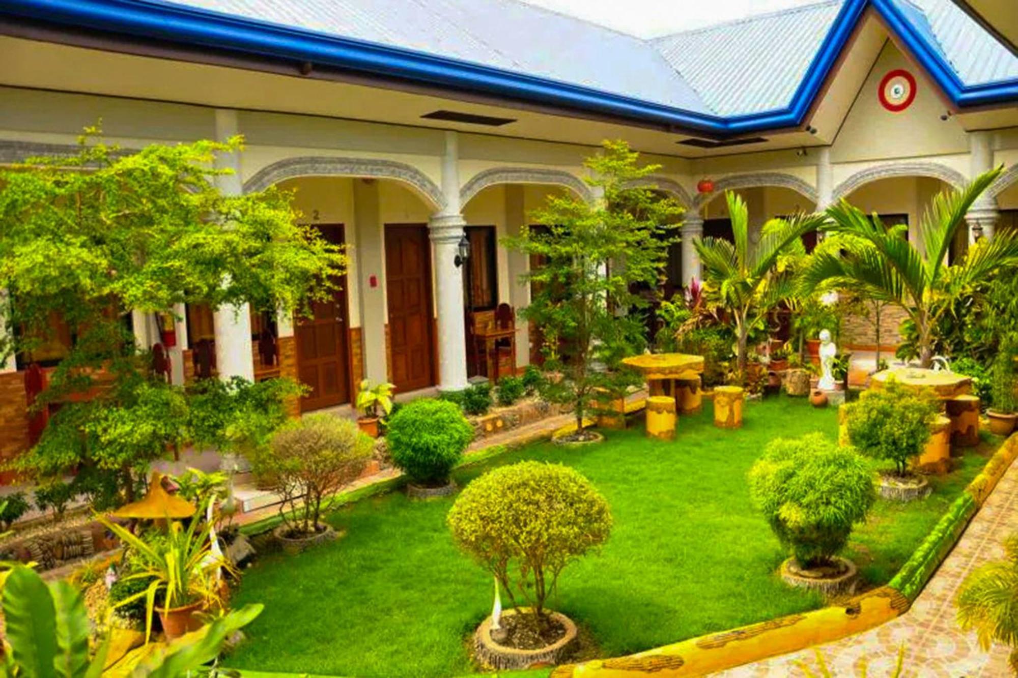 Mbg Travellers Inn Powered By Cocotel Puerto Princesa Luaran gambar