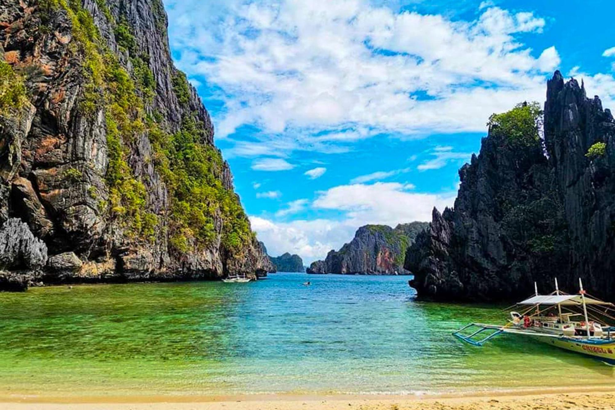 Mbg Travellers Inn Powered By Cocotel Puerto Princesa Luaran gambar